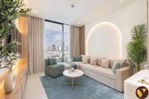 Vogue Vacation Homes, JVC Binghatti Phoenix near Circle Mall, One Bedroom Apartment with Balcony and Access toAmenities