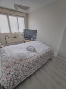 Chambre cosy , garage sécurisé pour deux-roues