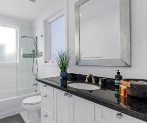 Modern Four-Bedroom Home With Private Patio and Convenient Parking