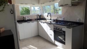 Casa en Punta Colorada con gran fondo y fogón