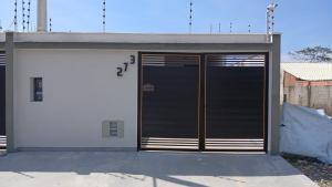 Casa 3 quartos sendo 1 suite ar Cond com piscina 300 metros da praia