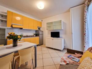 Colorful apartment with fenced garden and fireplace