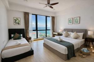 High Floor Seaview 2BR suites with Pool Sauna & Bathtub Near Gurney George Town Jazz Suites 253A