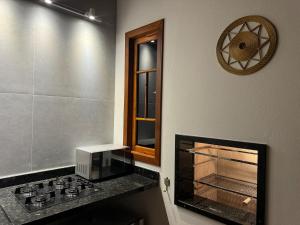 Casa Ágata Piscina à Beira do Rio na Mata, Camburi