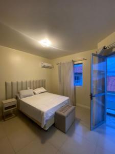 Alugo quarto - 200m da praia