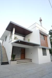 Siddhus Nest - Near to Lulu mall, Kochuveli Railway station and KIMS Hospital