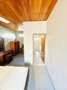 Harmony Guest House & Top Secret Beach
