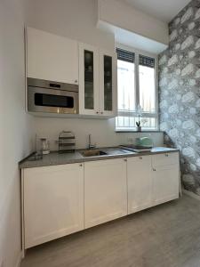 Flowers, a cozy suite in Milan