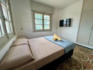 Piriapolis Centro Playa a una cuadra parrillero y cochera 4 habitaciones 3 banos