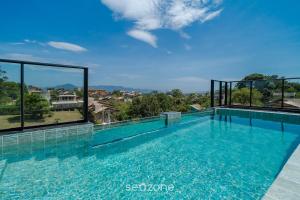 Studio Completo com Piscina na Praia do Rosa - RSOs