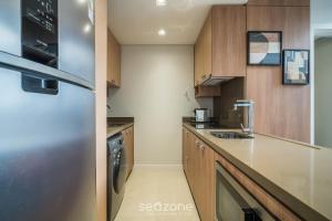 Loft Completo a 290 m da Praia COE0202