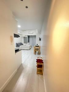 Charming 1BR condo unit Across US Embassy