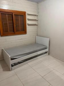 Casa com três quartos, piscina e área Gourmet