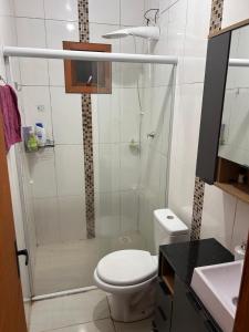 Casa com três quartos, piscina e área Gourmet