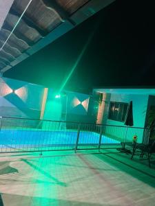 Casa com grade na piscina,ideal para familia com crianças