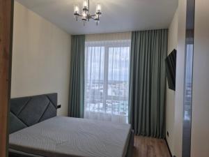 Дизайнерська квартира з видом з 14 поверху