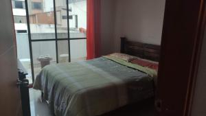 Habitacion cerca a SENDA DE CARNAVAL con cocina para desayuno