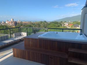 Cobertura panorâmica por do sol e jacuzzi