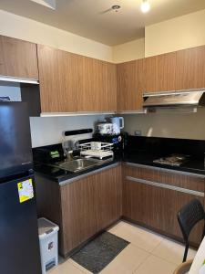 1BR Condo In Pasay Near Airport, Star City,PICC, CCP, MOA and US Embassy With Free WiFi, Swimming Pool and Netflix