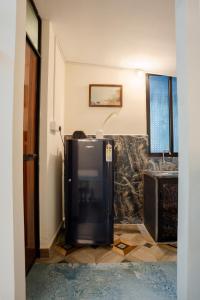 1BHK Private Goan Cottage in a Peaceful Palm Grove