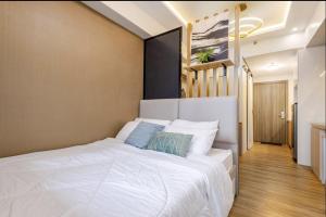 EJs Crib Cozy 1BR Condo at SMDC Fame