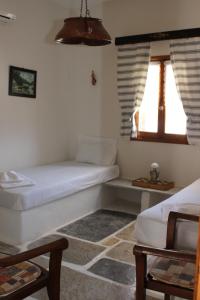 Traditional House by The Beach Ios Greece