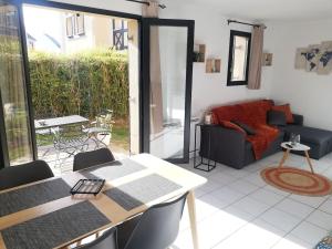 Appartement avec jardin à 50 m de la plage et 2 vélos inclus