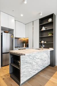 Designer 1BR Sofa Bed in Aspire Skyline Views