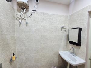 Flora inn Near Srimanta Sankaradeva Kalakshetr