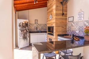 Casa com 3 quartos toda climatizada com Piscina e Lazer