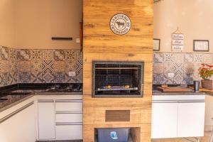 Casa com 3 quartos toda climatizada com Piscina e Lazer