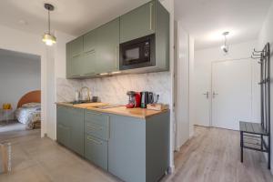 T2 familial avec jardin, calme à 15 min de Disney