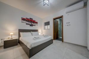 Seafront home with private terrace in Marsascala by 360 Estates