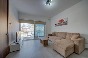 Seafront home with private terrace in Marsascala by 360 Estates