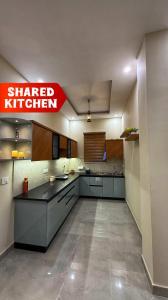 Beach Room, Modern Stay in Dehradun with Balcony