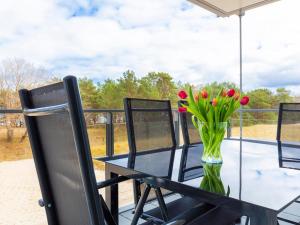 Prora - Familienfreundliche Ferienwohnung mit Balkon, Waschmaschine, Trockner und Gemeinschaftssauna - Dünenheide 2,1