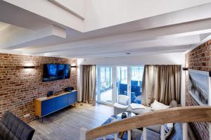 Prora - Apartment auf 2 Etagen mit Sauna, Balkon, E-Ladestation und Dünenblick - Sandburg