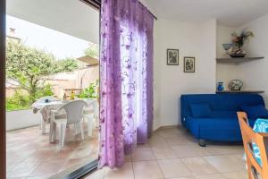 Cozy veranda retreat near Budoni