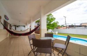 Casa c piscina pra 18 pessoas em Porto