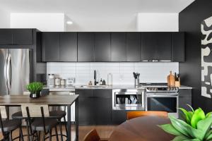 Upscale Riverview Condo with Garage plus Walk to Downtown