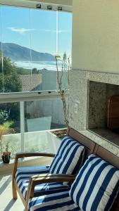 CONDOMINIO CLUBE FRENTE MAR SANTINHO - 105 v6