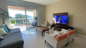 CONDOMINIO CLUBE FRENTE MAR SANTINHO - 105 v6