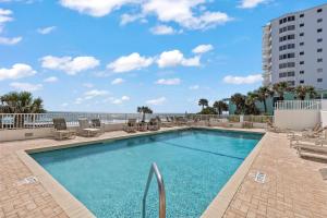 Direct oceanfront penthouse 22 with gorgeous corner condo views, a heated pool, and garage