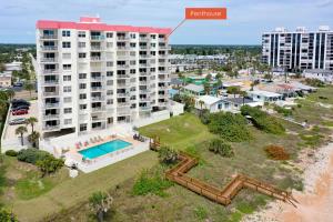Direct oceanfront penthouse 22 with gorgeous corner condo views, a heated pool, and garage