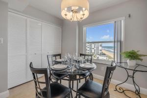 Direct oceanfront penthouse 22 with gorgeous corner condo views, a heated pool, and garage
