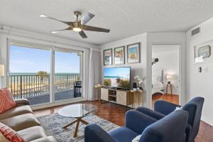 Ground floor direct oceanfront 22 with a balcony, heated pool, and garage parking