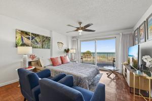 Ground floor direct oceanfront 22 with a balcony, heated pool, and garage parking