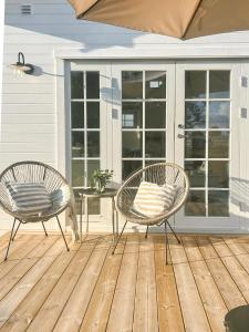 Minihus i lantlig miljö nära havet