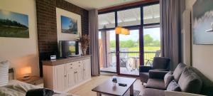 Ferienwohnung "Küstenkrümel No 16 - Aurora Vista"