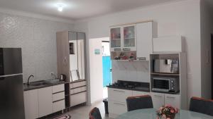 Casa com 2 quartos, ar condicionado e pet friendly